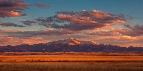 Vibrant Sunset Over the Colorado Eastern Plains: Majestic Pikes Peak View with Colorful Clouds and Agricultural Landscapes Near Denver