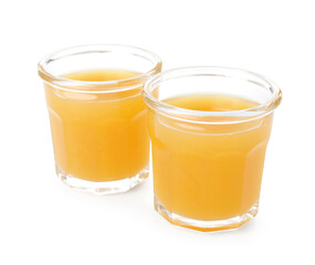 Glasses of fresh orange juice isolated on white