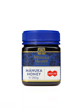 New Zealand's Manuka Health honey isolated on white background 250 mgo