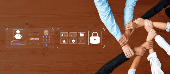 A diverse group of hands join together around a table, symbolizing teamwork and collaboration in digital security, emphasizing protection, scanning, and unity in an office environment. Trope