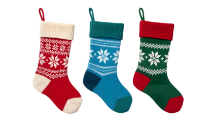 Festive christmas stockings in red green and blue with traditional nordic patterns isolated on transparent background