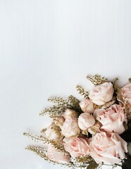 A bouquet of white roses on a white background with space for text. Background for congratulations, invitations.