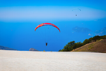 Flying paraglider at Babadag mountain in Turkey