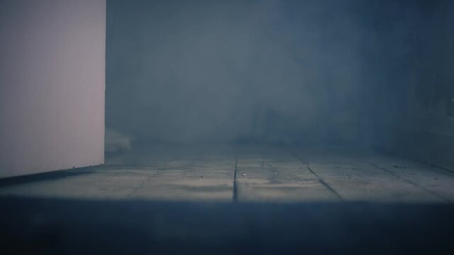 Room full of smoke with open door