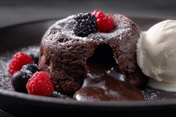 Decadent molten lava cake oozing rich chocolate.