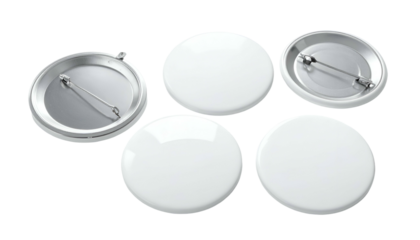 Five blank round button badges; two open to show metal pin backing, on black background