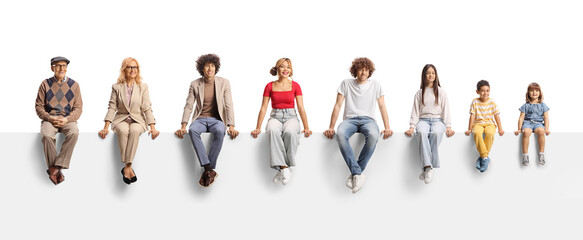 Children and adults sitting on a blank panel