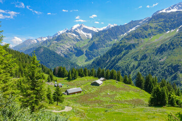 French traditional architecture and the alpine landscape in July 