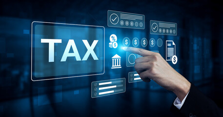 A businessman interacts with a digital interface displaying tax information and financial metrics, symbolizing modern tax calculation and management solutions. Gantry