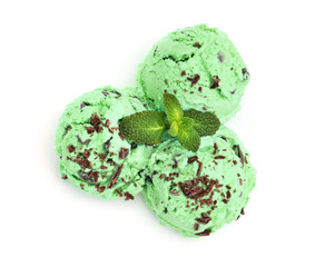 Balls of mint chocolate chip ice cream with leaves isolated on white, top view