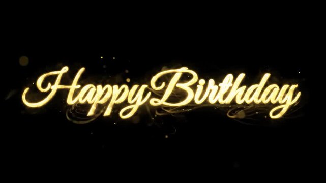 Elegant, luminous golden cursive 'happy birthday!' words materialize with shimmering light, surrounded by effervescent particles on a deep black void. Birthday celebration concept