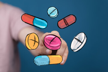 Image of hand interacting with colorful pills and capsules. Perfect for healthcare, medicine, pharmacy, and health concepts.