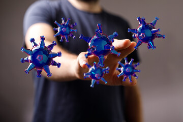 Visual representation of the coronavirus or illness concept. Man with hand out to touch virus, healthcare and