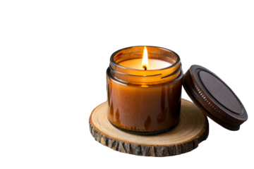 Warm amber scented candle with a lit wick on a wooden slice, surrounded by coffee beans and star anise, ideal for home decor and cozy ambiance promotion.