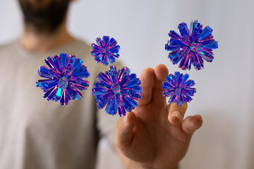 Artistic representation of digital spheres interacting with a hand, futuristic technology, creative design, di