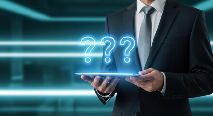 Business professional holding tablet with glowing question marks, symbolizing inquiry and innovation in a modern digital environment