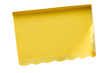 Yellow torn paper strip with textured edges for scrapbooking or notetaking in a bright overhead presentation.