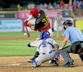 baseball player hitting left handed