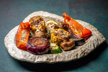 Halal tatar grilled vegetables on artisan plate