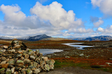 Mountain Plateau With Stone Cairn and Lakes Along Bjørgavegen Road, Aurlandsfjellet, Norway