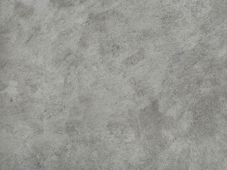 Close up of concrete washed cement texture with brush stroke, grunge, and dirt pattern. Suitable for wall and floor finishes. Seamless background texture. © TMR Studio