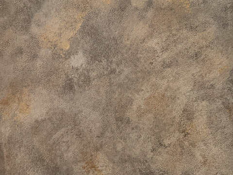 Decorative dark brown washed paint on a surface. Random limestone brown color washed paint with gold grunge, and dirt pattern. Seamless background texture. 