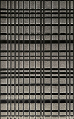 Series of 3D carving in checkerboard and grouts line pattern, carved on grey material. Suitable for wall panel decoration, and interior elements. Seamless background texture