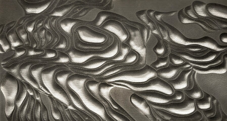 Close up of 3D carving in random stream wavy pattern, organic parametric shapes carved on grey...