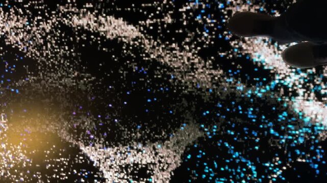 Footage of interactive led screen graphic playing colorful sand and sparkling grains of waves streaming randomly with wavy direction. Led lights play, modern technology. In blue, black, and white colo