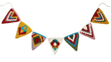 Colorful nepalese prayer flags hanging against a black background