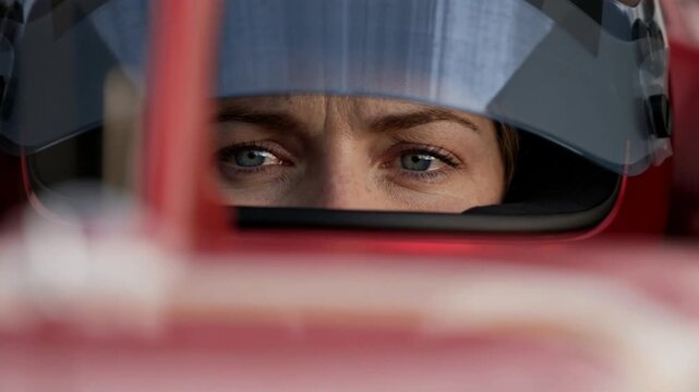 Female race car driver wears helmet and balaclava. F1, F2. AI generation