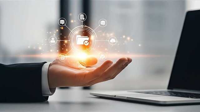 Business professional holding digital network of data icons cloud storage document management