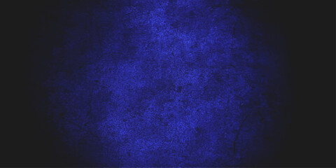 Dark blue abstract background with purple nebula, starry light, and cloud texture design. Blue abstract grunge wall texture pattern design for dark vintage paper backdrop