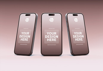 Three Smartphones Standing On Colored Background Mockup