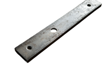 Square ruler for carpentry work displayed on a flat surface with focus on details