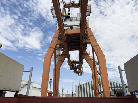 extremely large heavy-duty port cranes designed for handling metal cargo. very big capacity and swl