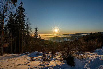 Beautiful sunny weather in the mountains with snow