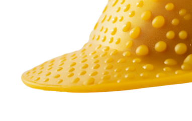 Close up detailed view of a yellow construction helmet showcasing safety design and durable materials for industrial use