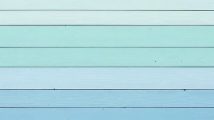 Light blue and green painted wooden planks create a serene textured background