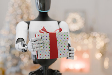 AI robot delivering a polka-dot wrapped present with a red bow. Blurred background of warm holiday lights. Technology and Christmas concept. Cyborg delivering a colorful gift box