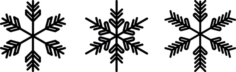 Intricate black and white snowflake patterns arranged in a symmetrical composition
