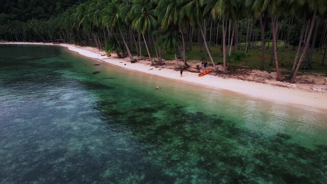 Beautiful tropical island with white sand and beaches surrounded by crystal clear blue water in Palawan, Philippines, South East Asia
