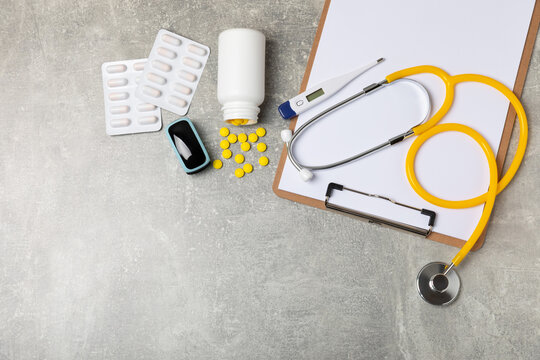 Stethoscope on the table. Medical instrument. Medical concept. Healthcare. Health Day.Doctor equipment. Cardiology. Heart disease.Lung diagnostics.Diagnosis of respiratory inflammation.Space for text - Powered by Adobe