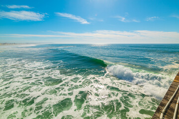 Waves in Pacific Beach on a sunny day