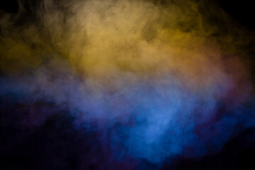 Blue and purple steam on a black background.