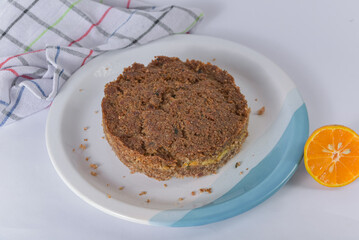 A serving of Brazilian baked kibbeh on a minimalist table