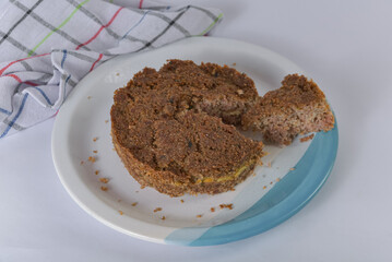 A serving of Brazilian baked kibbeh on a minimalist table