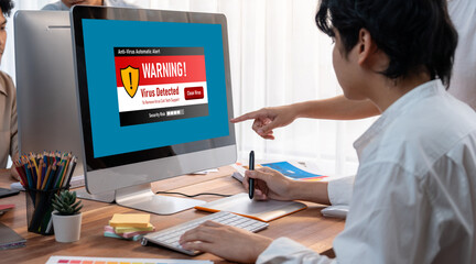 Virus warning alert on computer screen detected brisk cyber threat , hacker, computer virus and malware