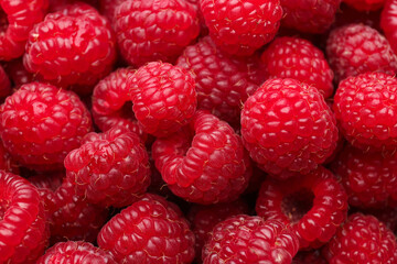 Fresh ripe raspberries as background, closeup view