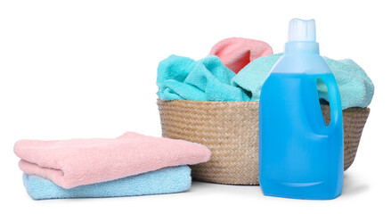Laundry basket with soft towels and bottle of detergent isolated on white